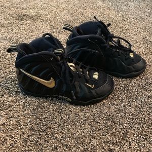 Black and gold nikes